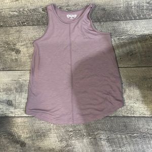 A purple XS tank top in women’s from Mudd.